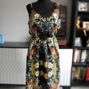 Medium, lightweight spring/summer/fall dress made by Love Stitch
